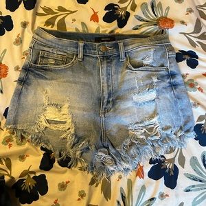distressed blue jean shorts